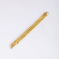 Bracelet en or jaune 18 carats composé de trois rangs, signé LALAOUNIS - Castafiore