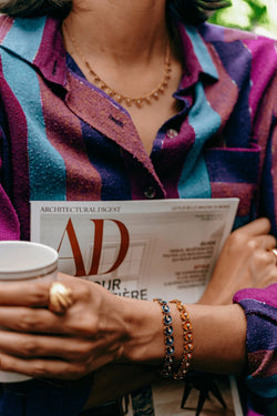 Bracelet en or jaune, émail bleu, sertie d'un diamant - Castafiore