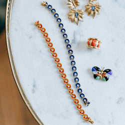 Bracelet en or jaune, émail gold, sertie d'un diamant - Castafiore