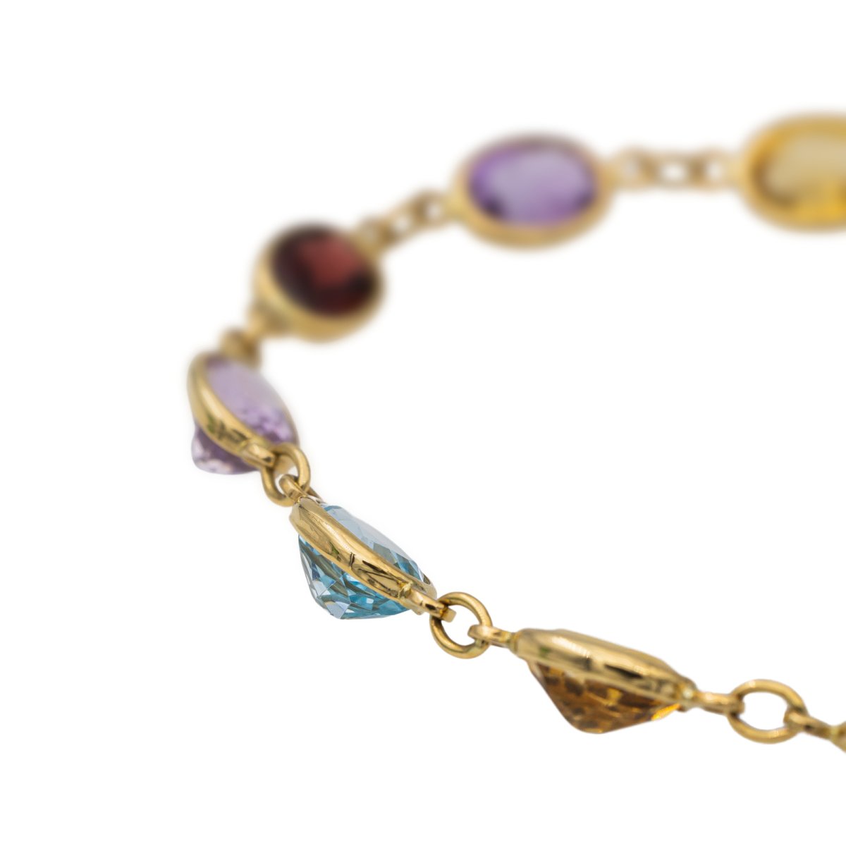 Bracelet en or jaune et pierres fines. - Castafiore