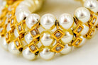 Bracelet en or jaune, perles et diamants - Castafiore