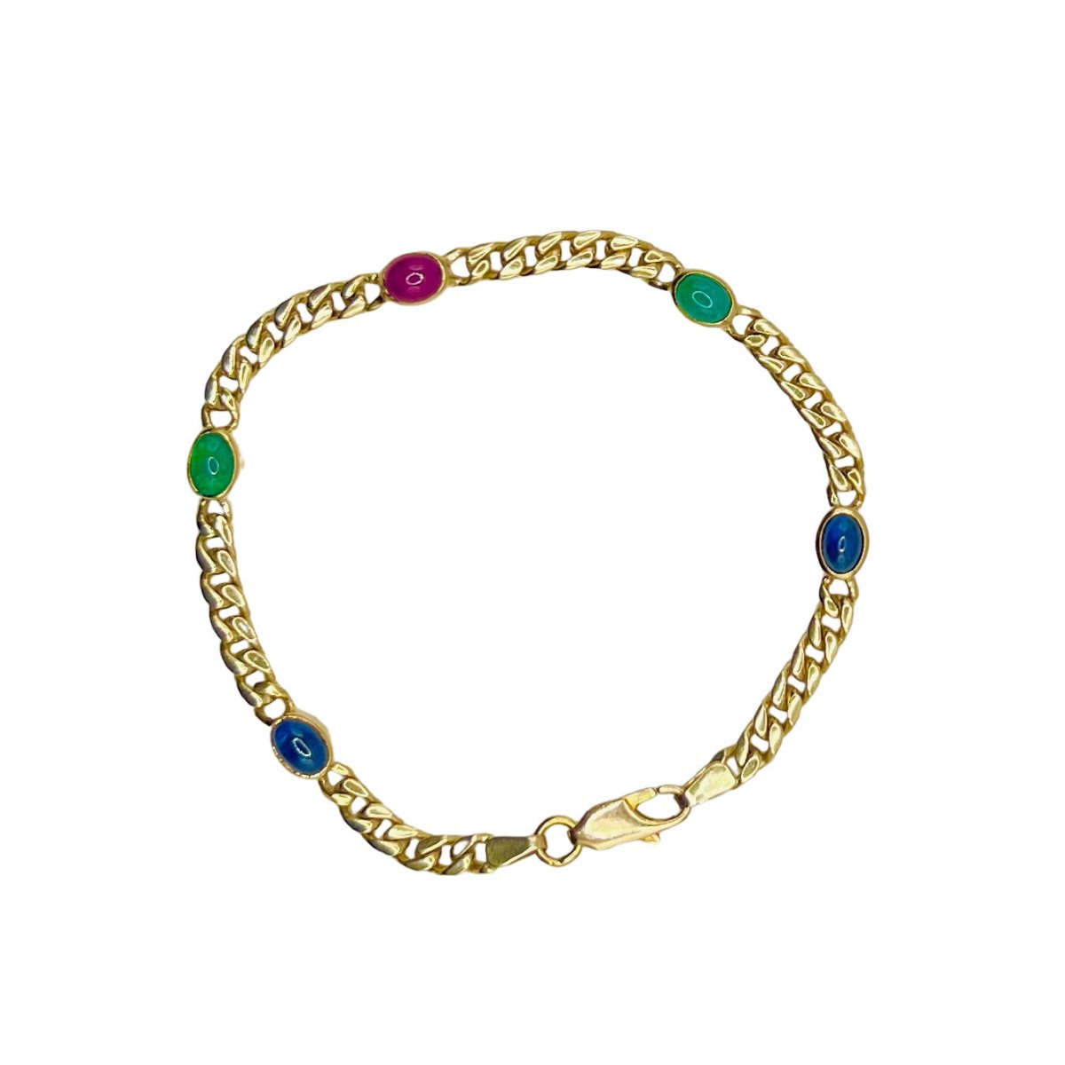 Bracelet en or jaune, saphirs, rubis et émeraudes - Castafiore