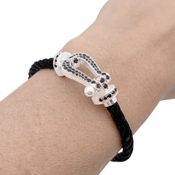 Bracelet FRED "Force 10" en or blanc, acier et diamants noirs - Castafiore