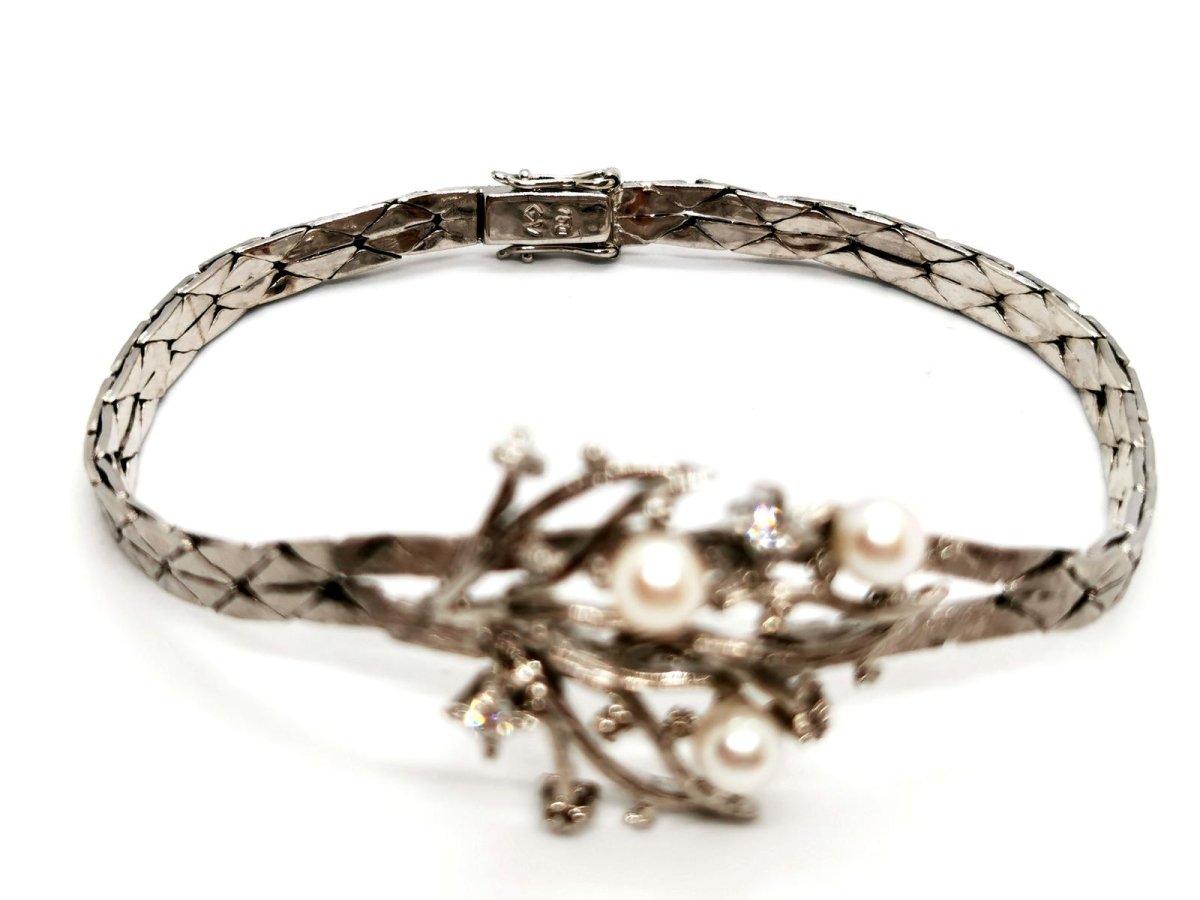 Bracelet géométrique motif feuillage en or blanc, perles et diamants - Castafiore