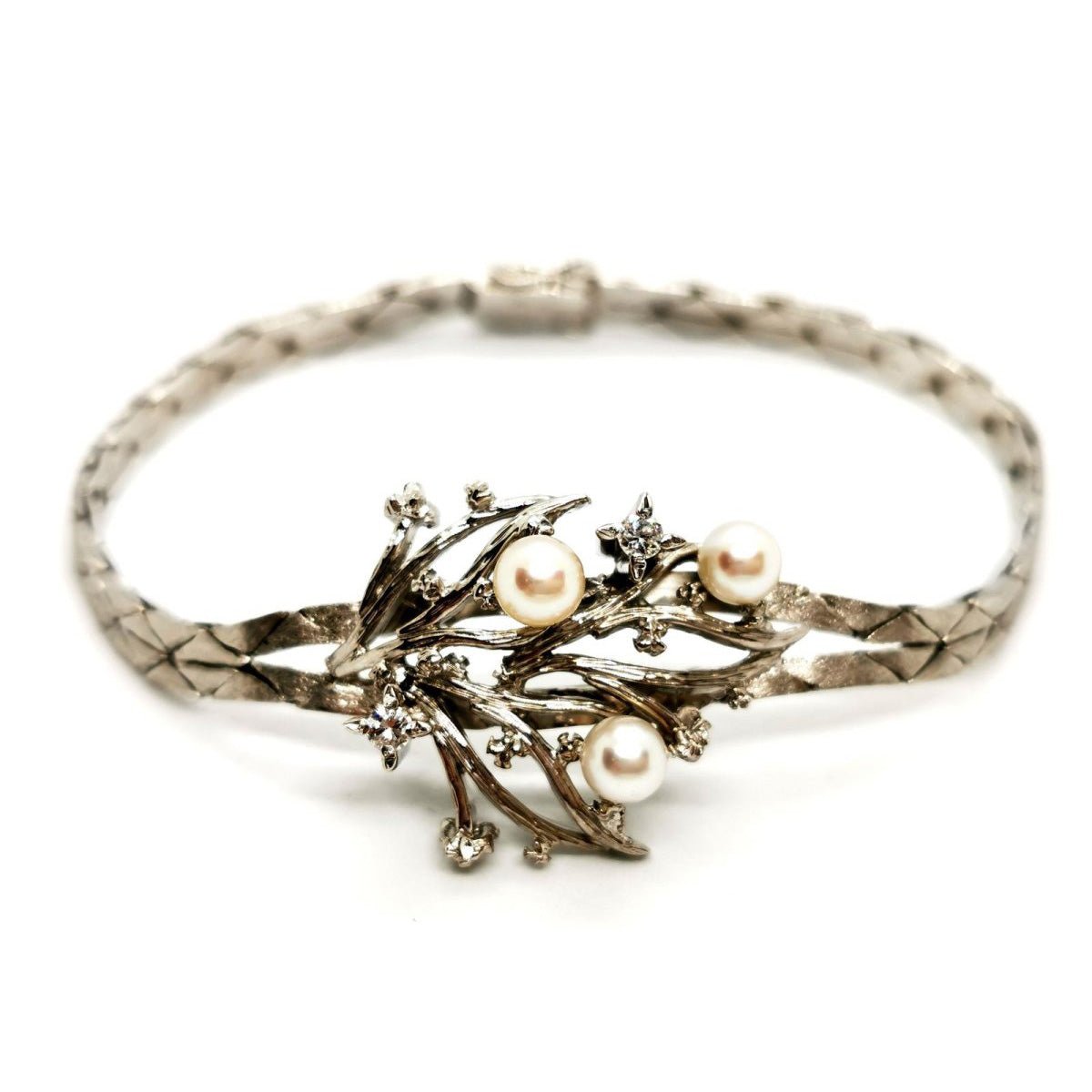Bracelet géométrique motif feuillage en or blanc, perles et diamants - Castafiore