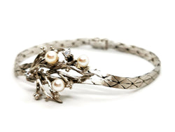 Bracelet géométrique motif feuillage en or blanc, perles et diamants - Castafiore
