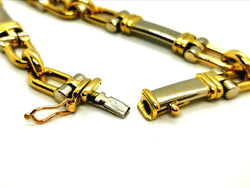 Bracelet Gourmette étrier en ors jaune et blanc - Castafiore