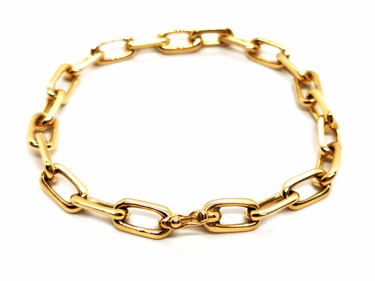 Bracelet Gourmette maille forçat en or jaune - Castafiore