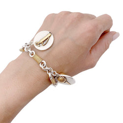 Bracelet HERMÈS "Golf" en or jaune et argent - Castafiore