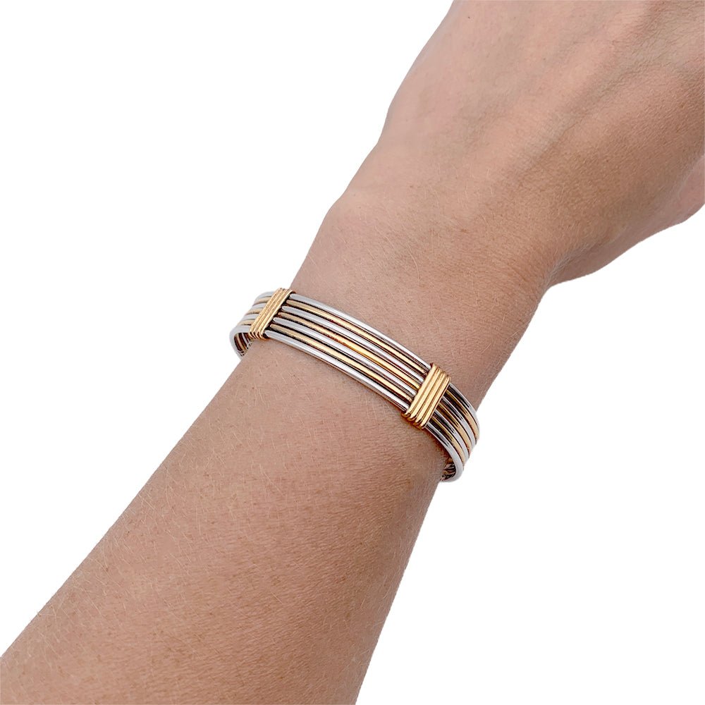 CARTIER Jonc bracelet in yellow gold and steel