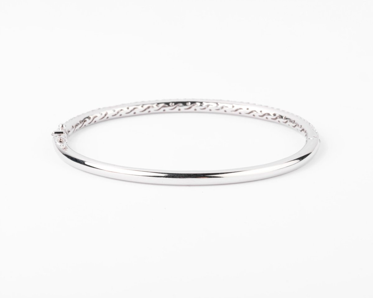 Bracelet jonc en or gris serti de 3 lignes de diamant - Castafiore