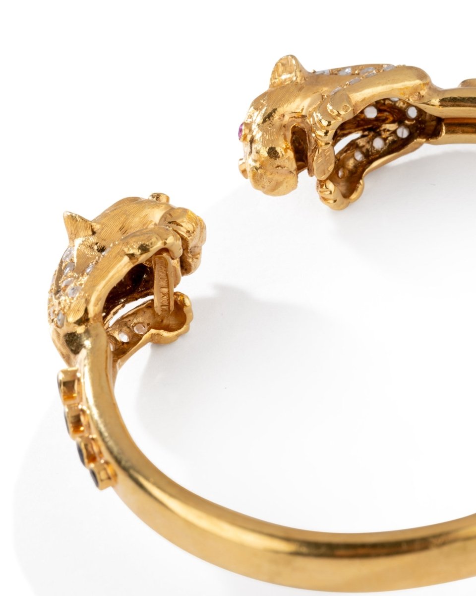 Bracelet Jonc LALAOUNIS en or jaune à deux têtes de lion - Castafiore