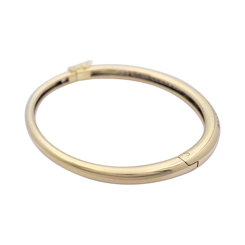 Bracelet jonc, or jaune et diamants. - Castafiore