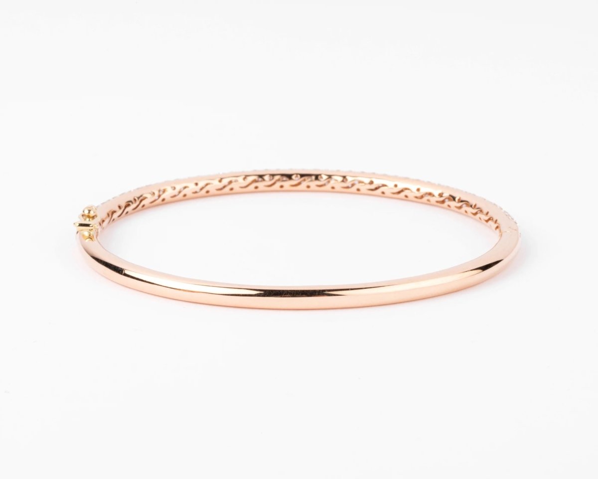 Bracelet jonc ouvrant en or rose serti de 3 lignes de diamant - Castafiore
