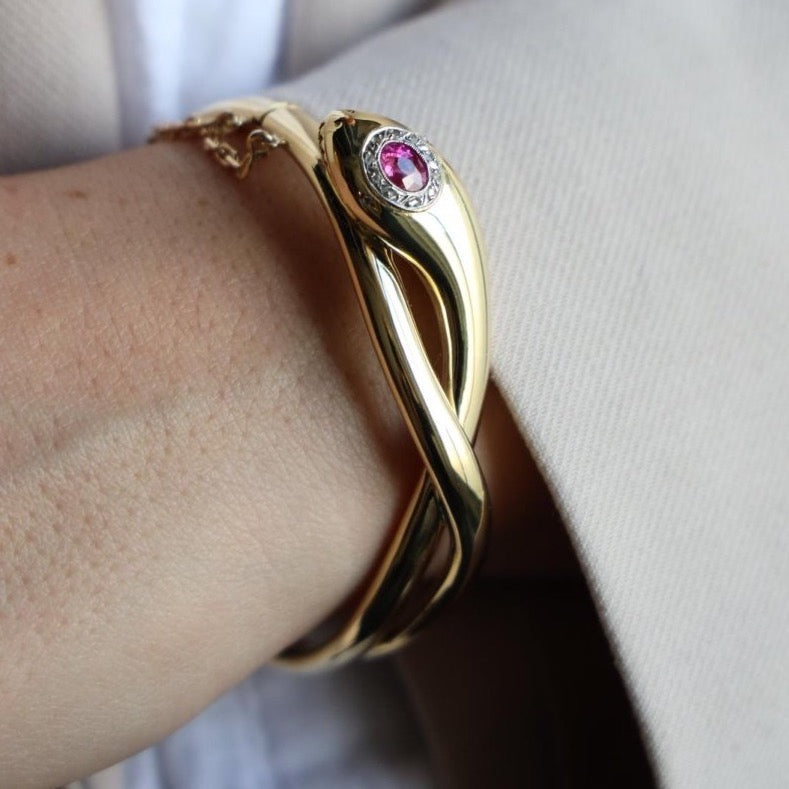 Bracelet Jonc serpent en 2 ors, rubis et diamants - Castafiore