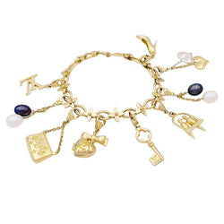 Bracelet Louis Vuitton, "Idylle", breloques, or jaune, or blanc, perles. - Castafiore