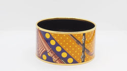 Bracelet Manchette HERMÈS en métal doré émaillé - Castafiore