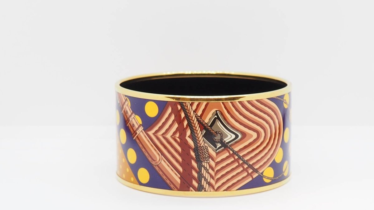Bracelet Manchette HERMÈS en métal doré émaillé - Castafiore