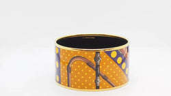 Bracelet Manchette HERMÈS en métal doré émaillé - Castafiore