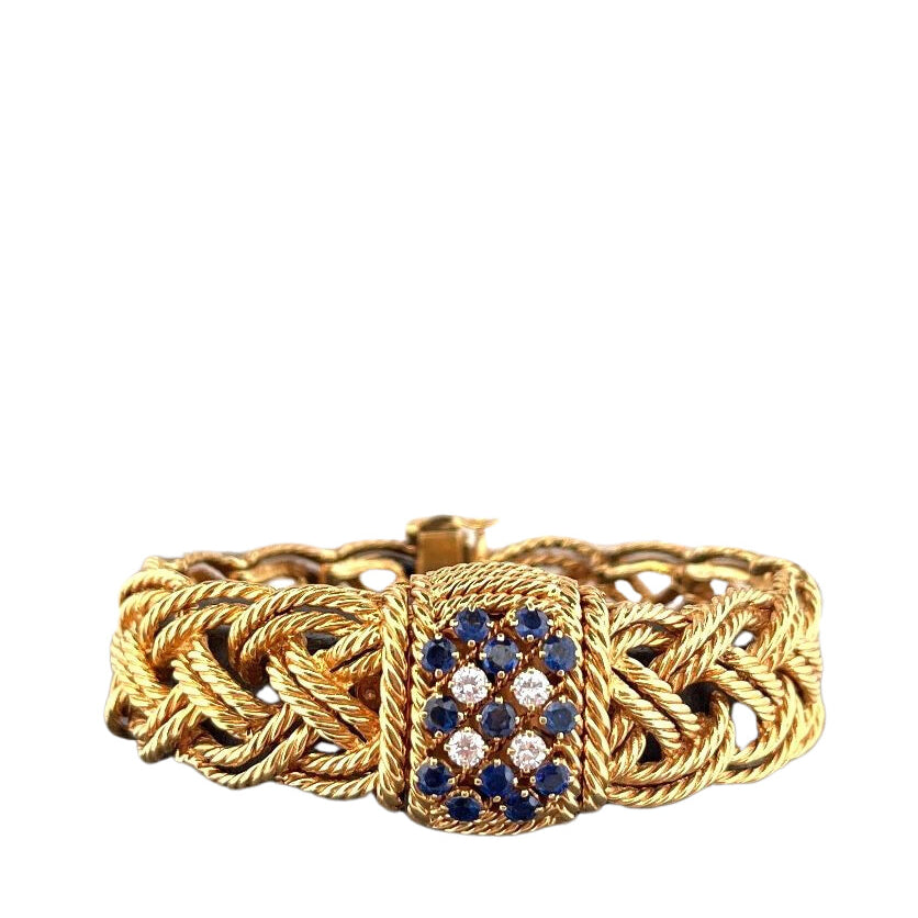 Bracelet Montre BOUCHERON en or jaune, diamants et saphirs - Castafiore