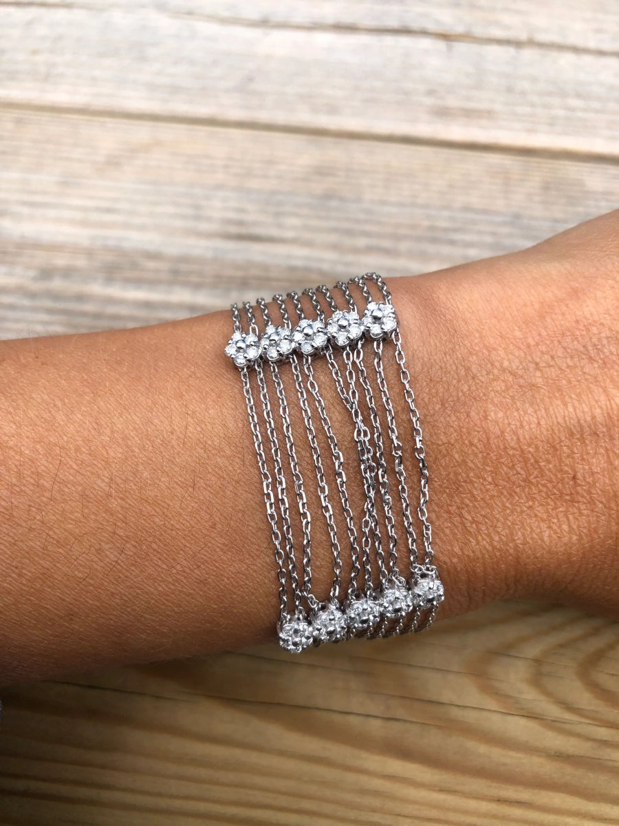 Bracelet or gris et diamant sur chaine força limée alternée de 4 motifs avec des fleurs - Castafiore