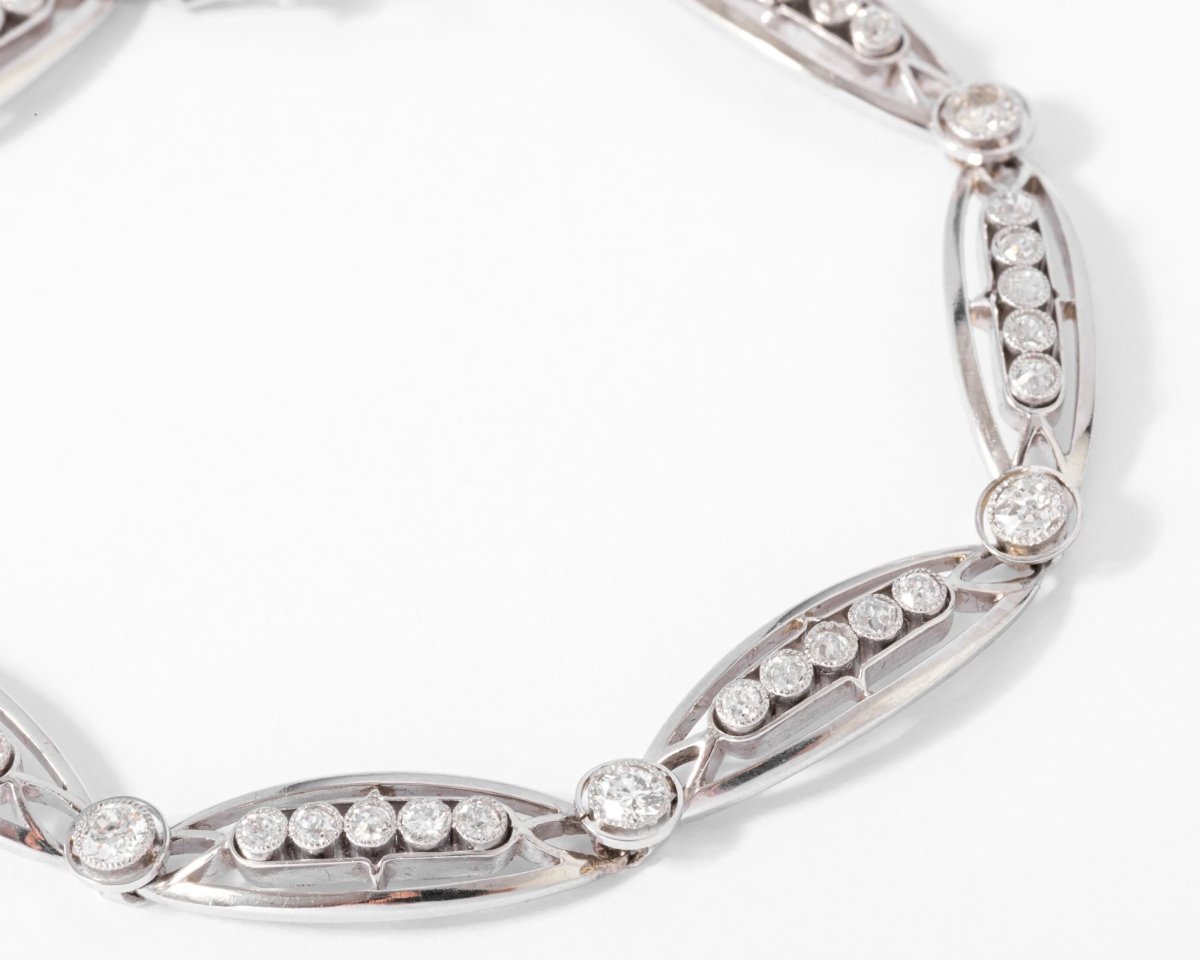 Bracelet or platine et et diamant formant des maillons ovales - Castafiore