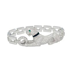 Bracelet "Panthère " CARTIER en or blanc, diamants, émeraude et onyx - Castafiore