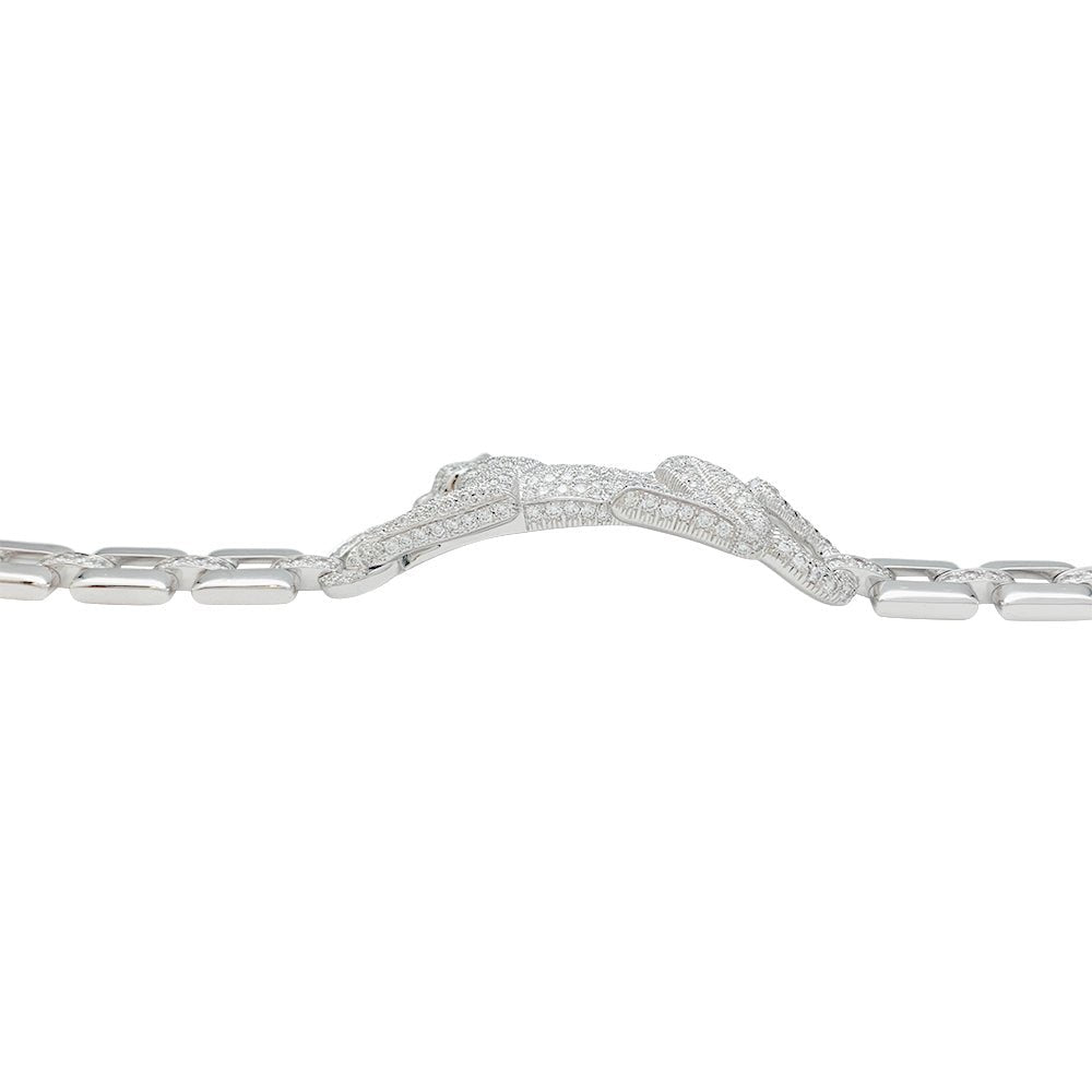 Bracelet "Panthère " CARTIER en or blanc, diamants, émeraude et onyx - Castafiore