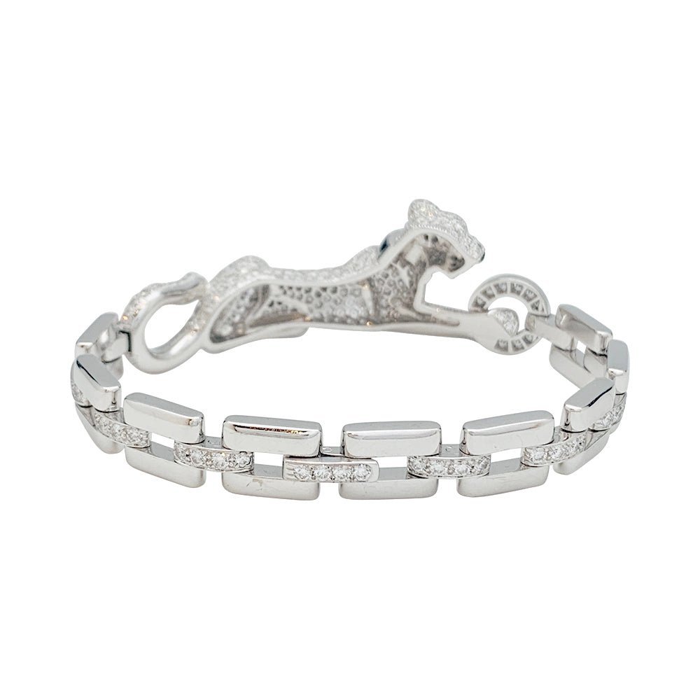 Bracelet "Panthère " CARTIER en or blanc, diamants, émeraude et onyx - Castafiore