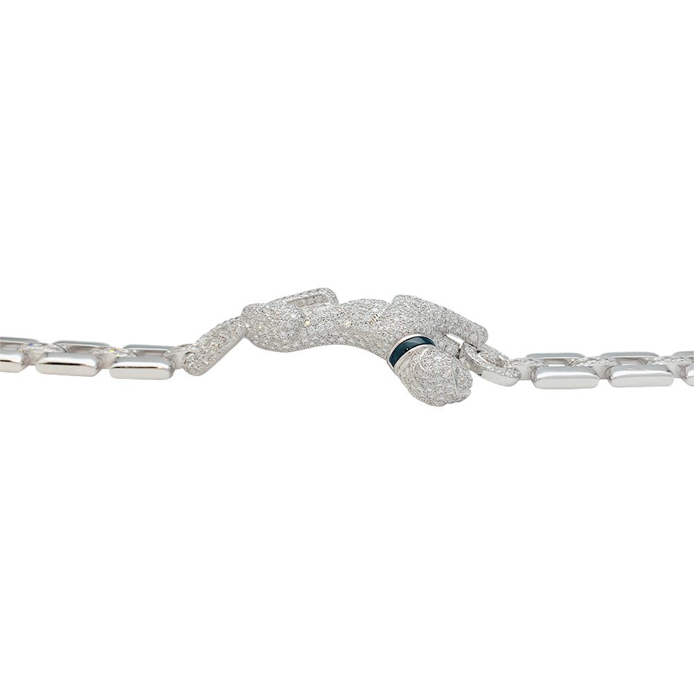 Bracelet "Panthère " CARTIER en or blanc, diamants, émeraude et onyx - Castafiore