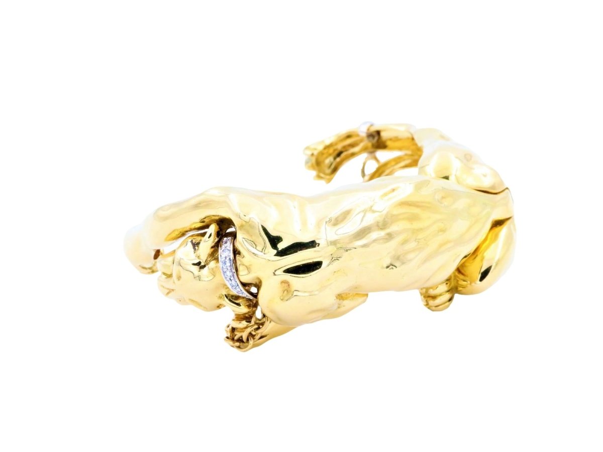 Bracelet Panthère en or jaune, or blanc, émeraudes et diamants - Castafiore