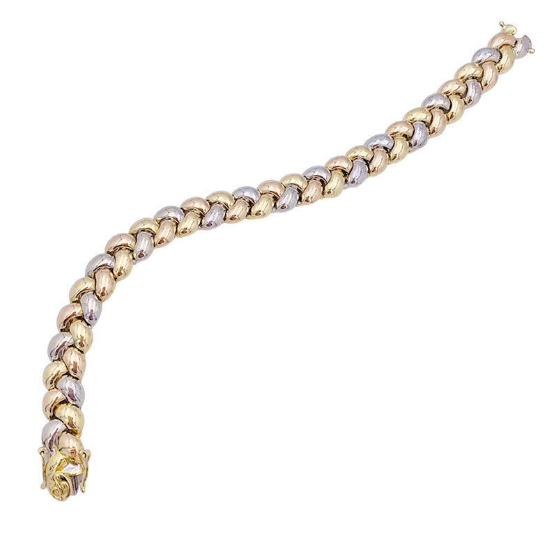 Bracelet Poiray, "Tresse", trois tons d'or. - Castafiore