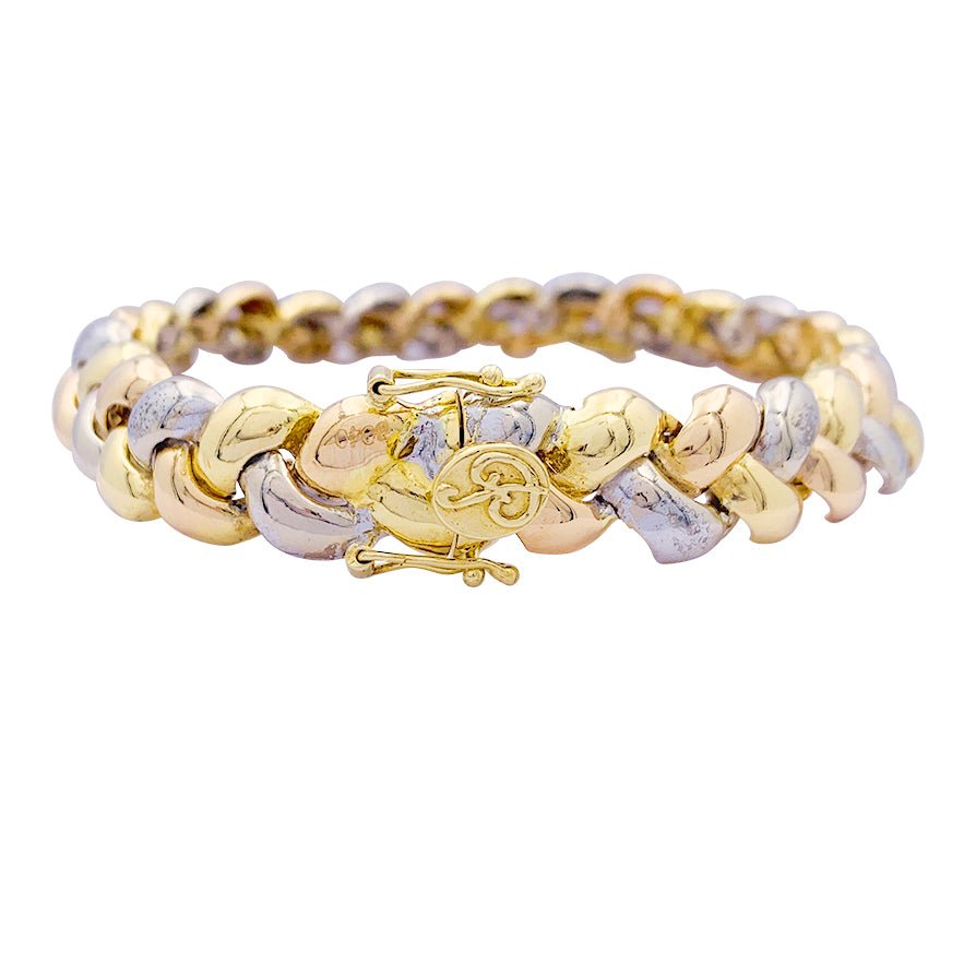 Bracelet Poiray, "Tresse", trois tons d'or. - Castafiore