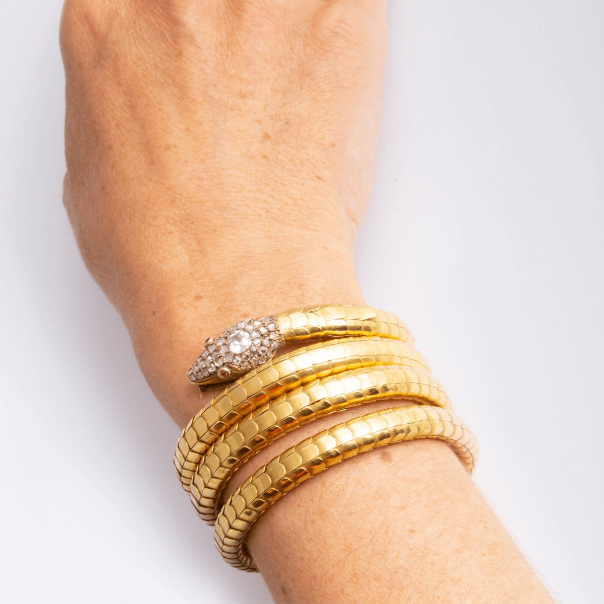 Bracelet serpent en or, rubis et diamants - Castafiore