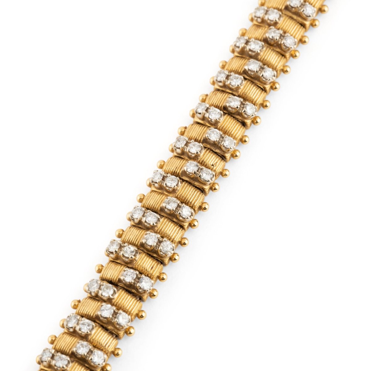 Bracelet souple en or jaune et diamants - Castafiore