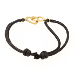 Bracelet sur cordon DINH VAN Menottes, en or jaune - Castafiore