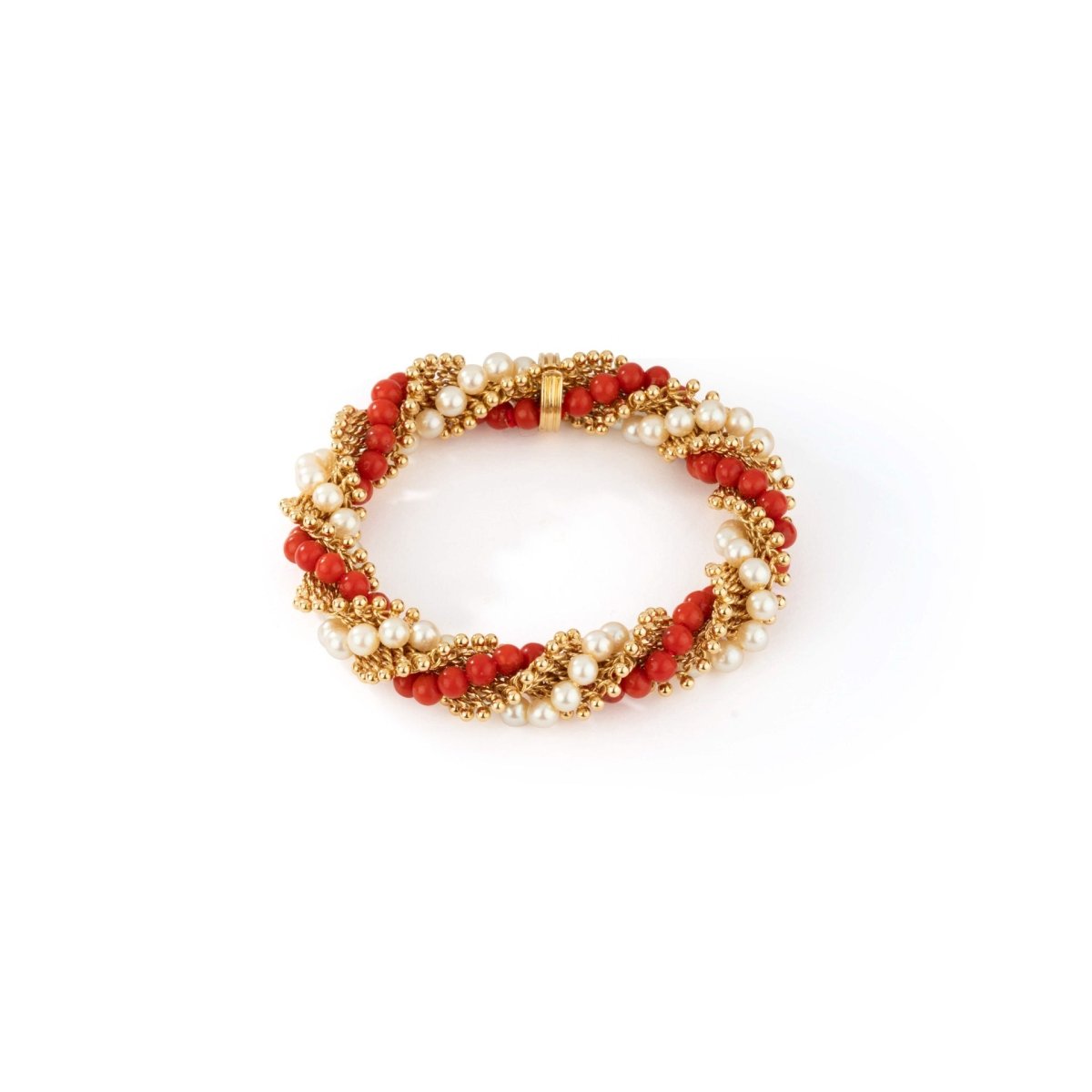 Bracelet VAN CLEEF & ARPELS "Twist" en or jaune, corail et perles - Castafiore
