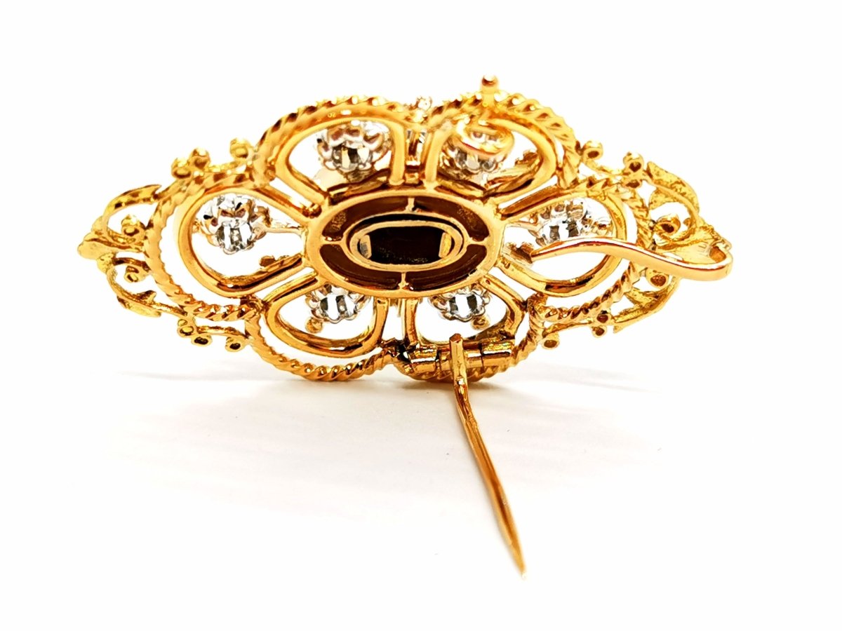 Broche Art déco en or jaune, platine, diamants et onyx - Castafiore