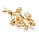Broche “bouquet de fleurs” en or jaune et diamants - Castafiore
