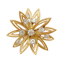 Broche CARTIER "Fleur" en or jaune et diamants - Castafiore