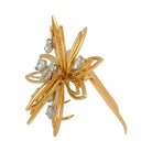 Broche CARTIER "Fleur" en or jaune et diamants - Castafiore