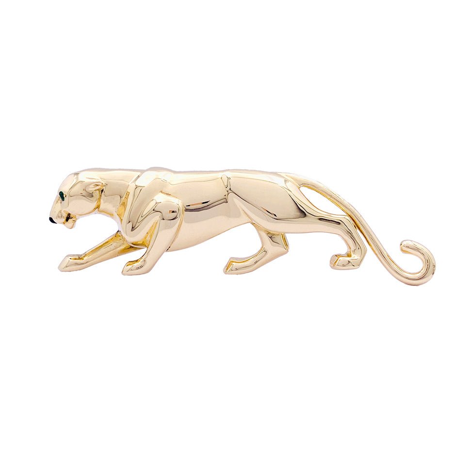 Broche Cartier, "Samantha", or jaune, émeraude et onyx. - Castafiore