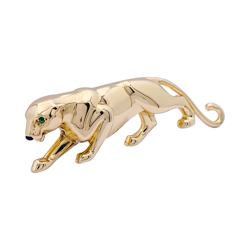 Broche Cartier, "Samantha", or jaune, émeraude et onyx. - Castafiore