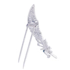 Broche CHAUMET "Plume" en or blanc et diamants - Castafiore