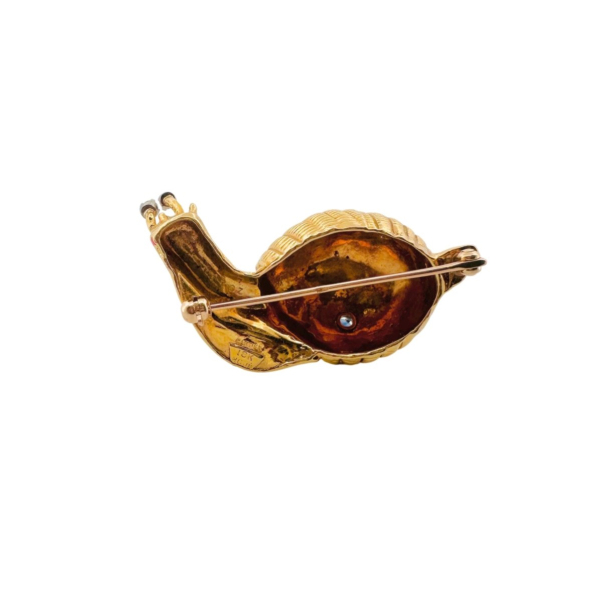 Broche Clip CARTIER "Escargot" en or jaune, saphir et diamant - Castafiore