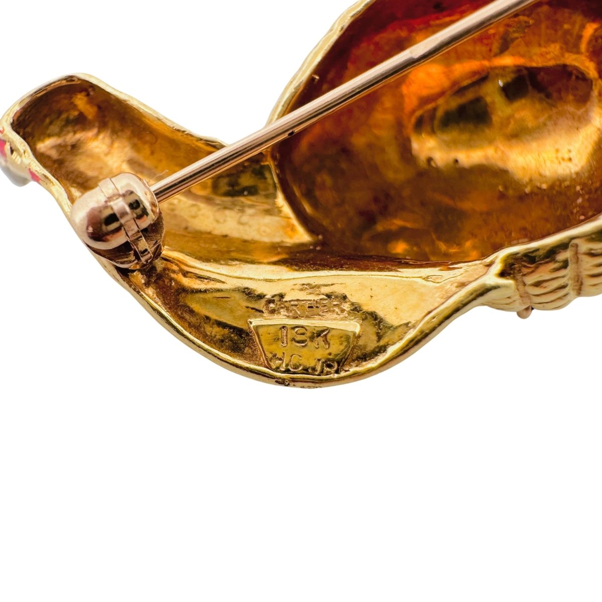 Broche Clip CARTIER "Escargot" en or jaune, saphir et diamant - Castafiore