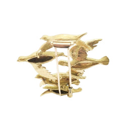 Broche Clip HERMÈS "Envol de perdreaux" en or jaune et émeraudes - Castafiore