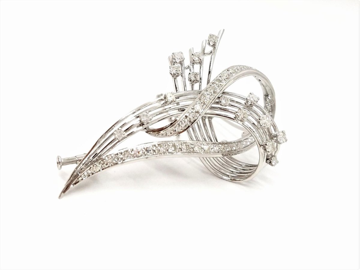 Broche en or blanc et diamants - Castafiore