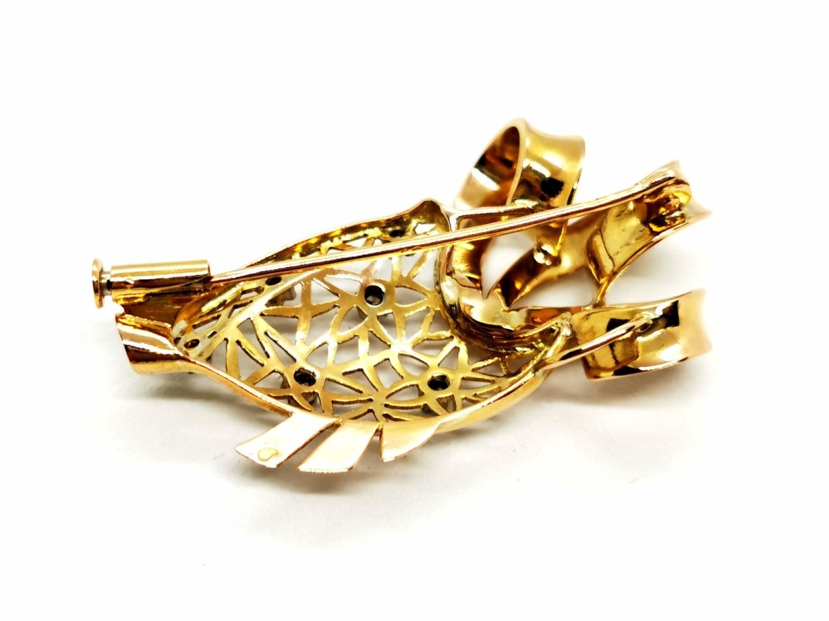 Broche en or jaune et diamants - Castafiore