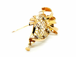 Broche en or jaune et diamants - Castafiore